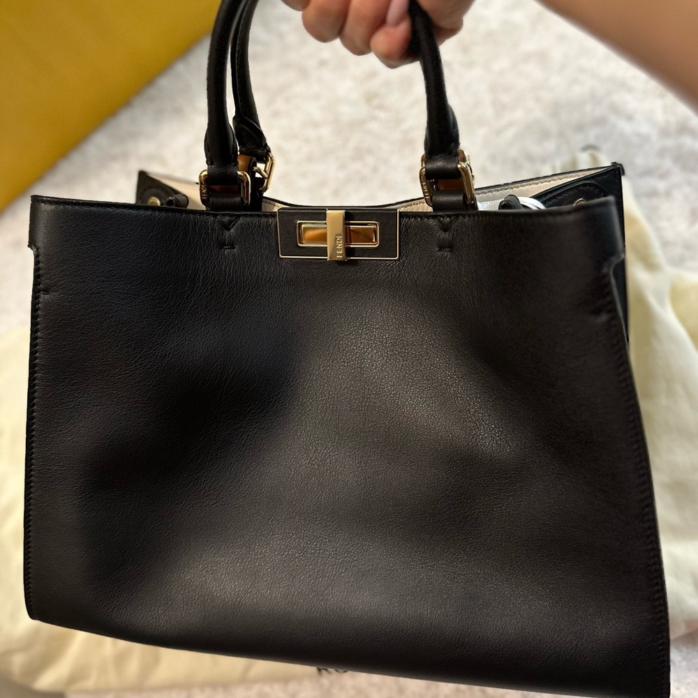 New with tags 
Peek A Boo shopper 
XLIte nwt